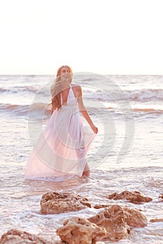 Fashion girl in a white dress