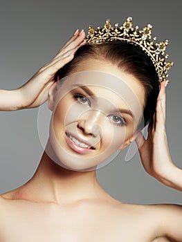 Fashion gorgeous woman in diamond crown, beauty contest winner. Luxury girl with bright makeup