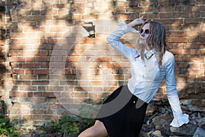 A fashion gothic style portrait of a beautiful blonde girl