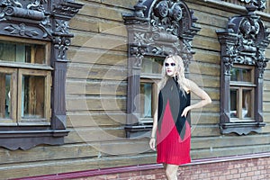 A fashion gothic style portrait of a beautiful blonde girl