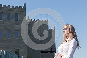 A fashion gothic style portrait of a beautiful blonde girl