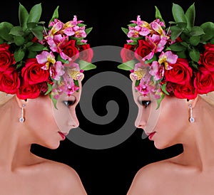 Fashion hairstyle. girl with roses. beautiful young woman with flowers in her hair over black