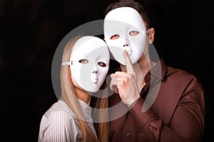 Fashion Happy Couple in Love holding with mask face