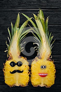Fashion Hipster Pineapple Fruit. Tropical pineapple with Sunglasses. Creative Art concept.