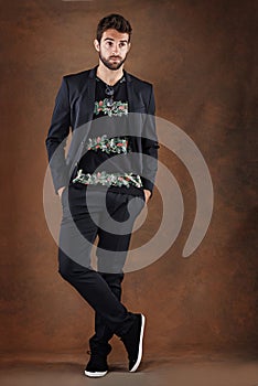 Fashion, hipster and thinking male person, formal clothing and blazer on isolated on studio background. Confidence