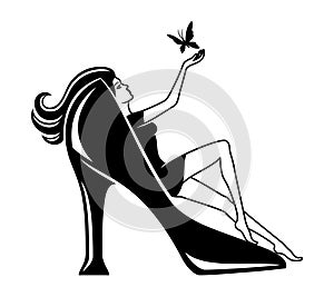 Fashion icon woman sitting in high heel shoes.