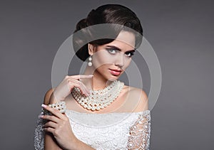 Fashion jewelry. Elegant fashionable woman portrait. Retro hair