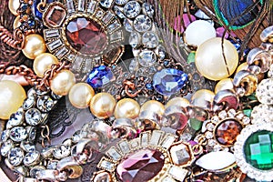 Fashion jewelrys. Fashion jewels as background. Jewelery texture. A lot of Jewells in texture. Jewellery background