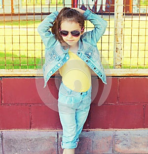 Fashion kid concept - portrait of stylish little girl child wear