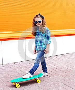 Fashion kid concept - stylish little girl child