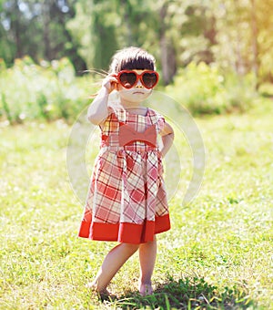 Fashion kid, little girl child wearing a dress