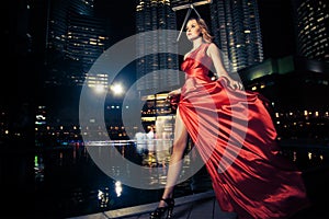 Fashion Lady In Red Dress And City Lights