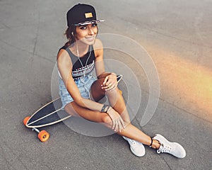 Fashion lifestyle, beautiful young woman with longboard
