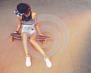 Fashion lifestyle, beautiful young woman with longboard