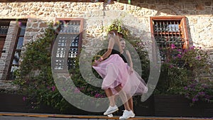 Fashion lifestyle two young women in tulle skirt funnily meet each other