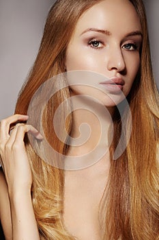 Fashion long hair. Beautiful blond girl,. Healthy straight shiny hair style. Beauty woman model. Smooth hairstyle