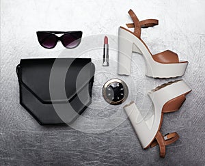 Fashion luxury female set, black handbag clutch, sunglasses, shoes heels, lipstick and little pocket mirror