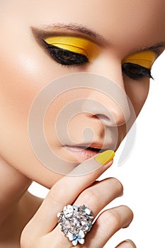 Fashion make-up. Glamour model face, bright makeup