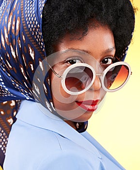 Fashion, makeup and sunglasses with portrait of black woman in studio for vintage, trendy and beauty. Elegant, retro and