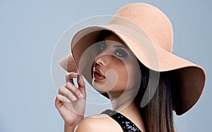 Fashion, makeup and woman in hat with glamour, confidence and pride in studio. Classic, vintage chic and elegant style