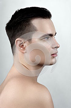 Fashion man with drops on face