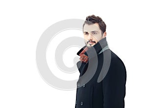 Fashion man looks aside isolated on white background