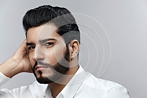 Fashion Man Portrait. Male Model With Hair Style And Beard