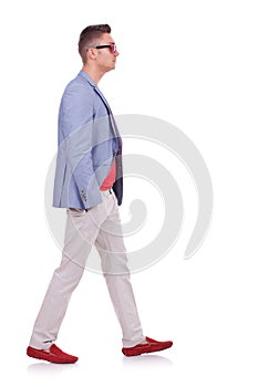Fashion man walking forward