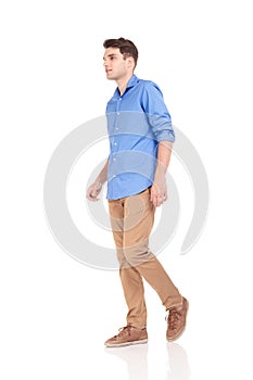 Fashion man walking on isolated background.