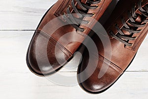 Fashion men`s boots.brown shoes still life
