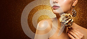 Fashion Model Beauty Make Up, Beautiful Woman hold Gold Flower Rose and Luxury Golden Makeup