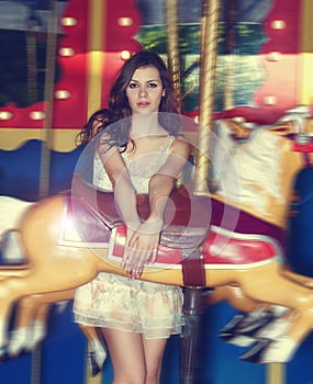 Fashion model on carousel photo