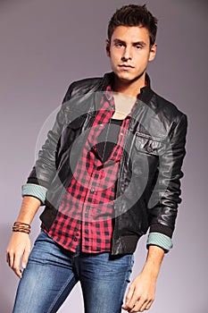 Fashion model in casual clothes and leather jacket