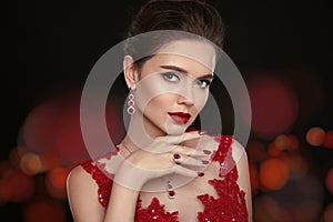 Fashion Model Diamond Jewelry. Beautiful young woman with makeup