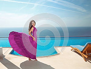 Fashion Model Dress, Smiling Woman in Flowing Fabric purple Gown