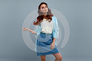 Fashion Model Girl In Beautiful Fashionable Clothes In Studio