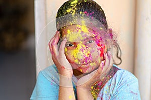 Fashion Model Girl colorful face paint. Beauty fashion art portrait of beautiful woman girl with flowing liquid paint holi,
