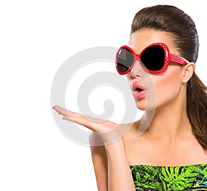 Fashion model girl wearing red sunglasses