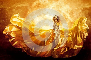 Fashion Model Gold Color Skin, Fantasy Woman Beauty in Artistic Waving Dress, Flying Silk Gown