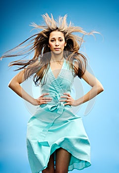 Fashion model with hair flying photo