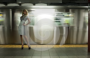 Fashion model posing at NYC subway