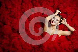 Fashion Model on Red Flounce Waves Background, Woman Beauty photo