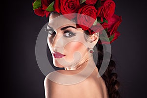 Fashion model with red roses hairstyle