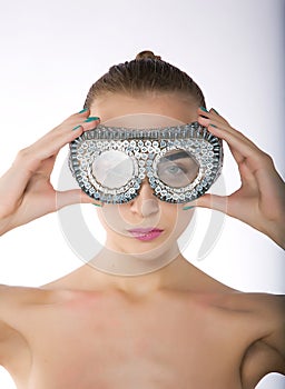 Fashion model in swim goggles