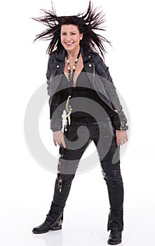 Fashion model wearing leather pants and jacket