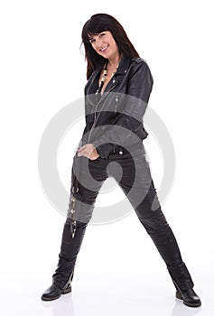 Fashion model wearing leather pants and jacket