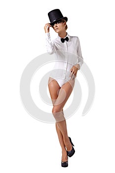 Fashion model in white combi dress and top hat