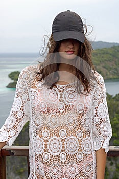 Fashion model with white lace sunbathing