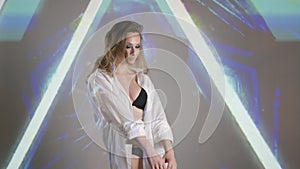 Fashion model woman in neon light, beautiful model girl, Art design of female disco dancer dancing in UV light, slow