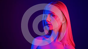 Fashion model woman in neon light, portrait of beautiful model girl with fluorescent powder make-up, Art design of